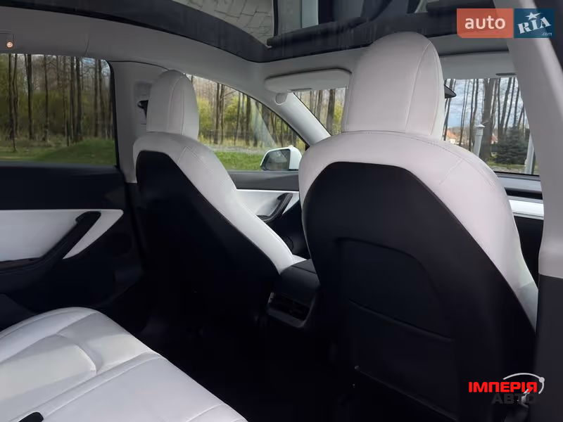 Tesla Model Y - фото 32