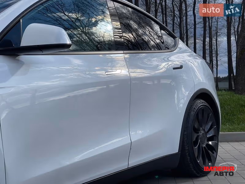Tesla Model Y - фото 11