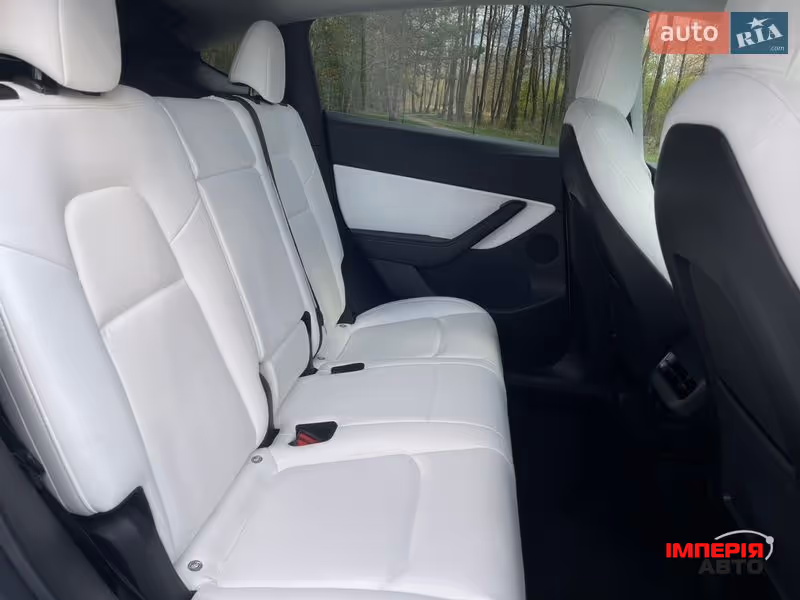 Tesla Model Y - фото 33