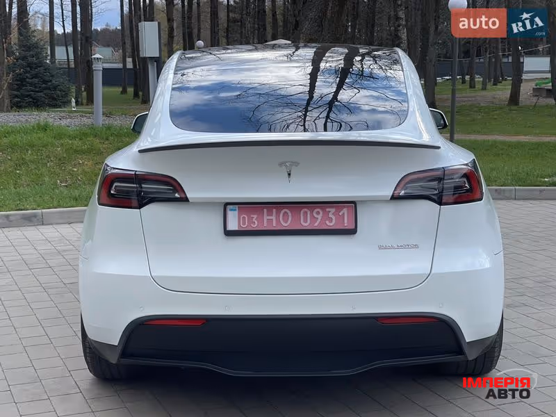 Tesla Model Y - фото 18