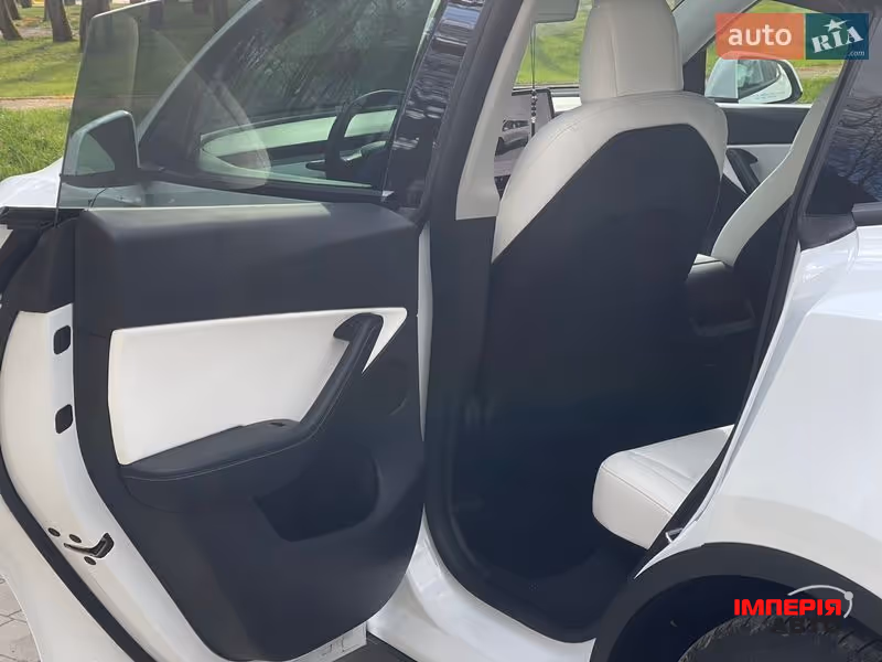 Tesla Model Y - фото 28