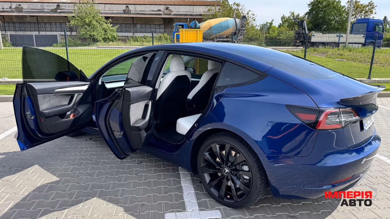 Tesla Model 3 - фото 8