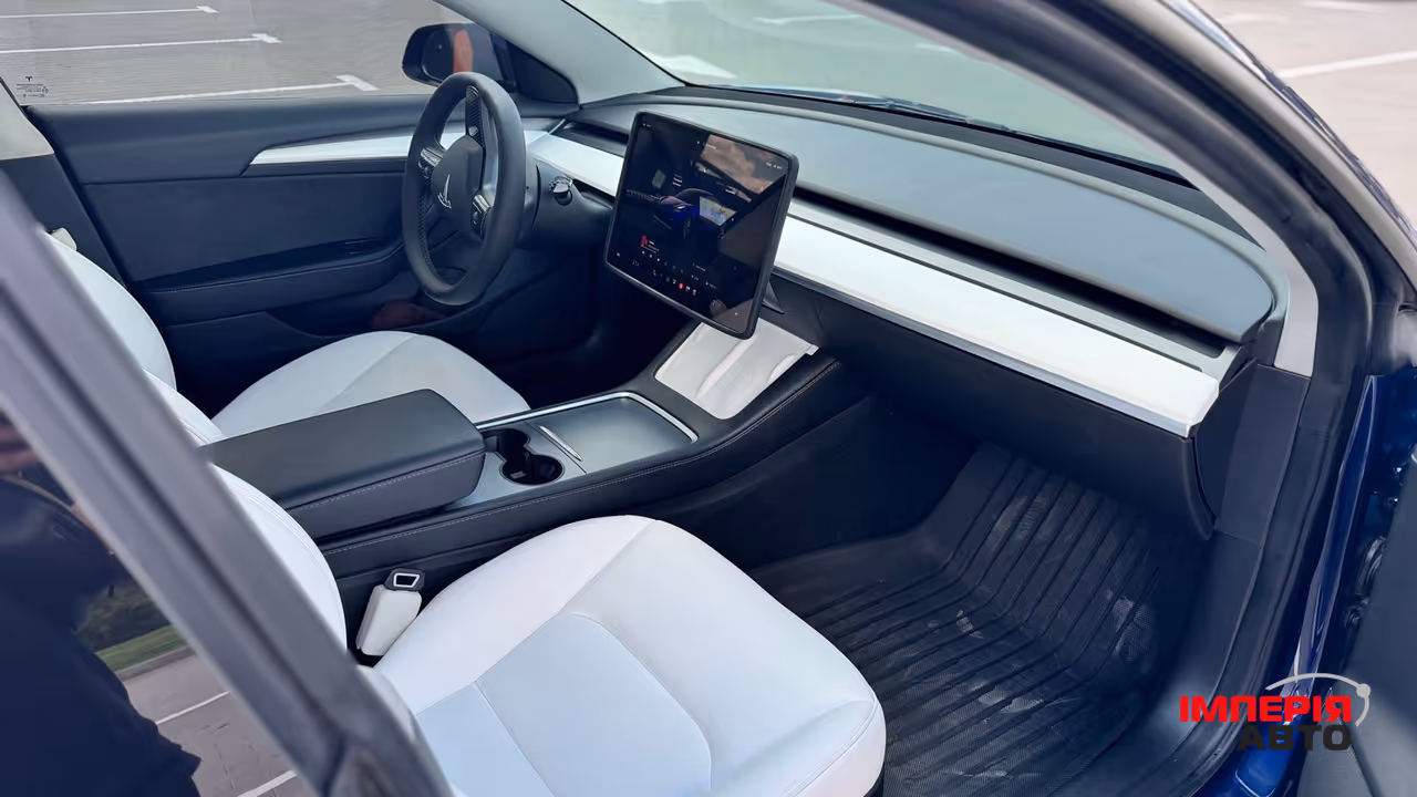Tesla Model 3 - фото 34