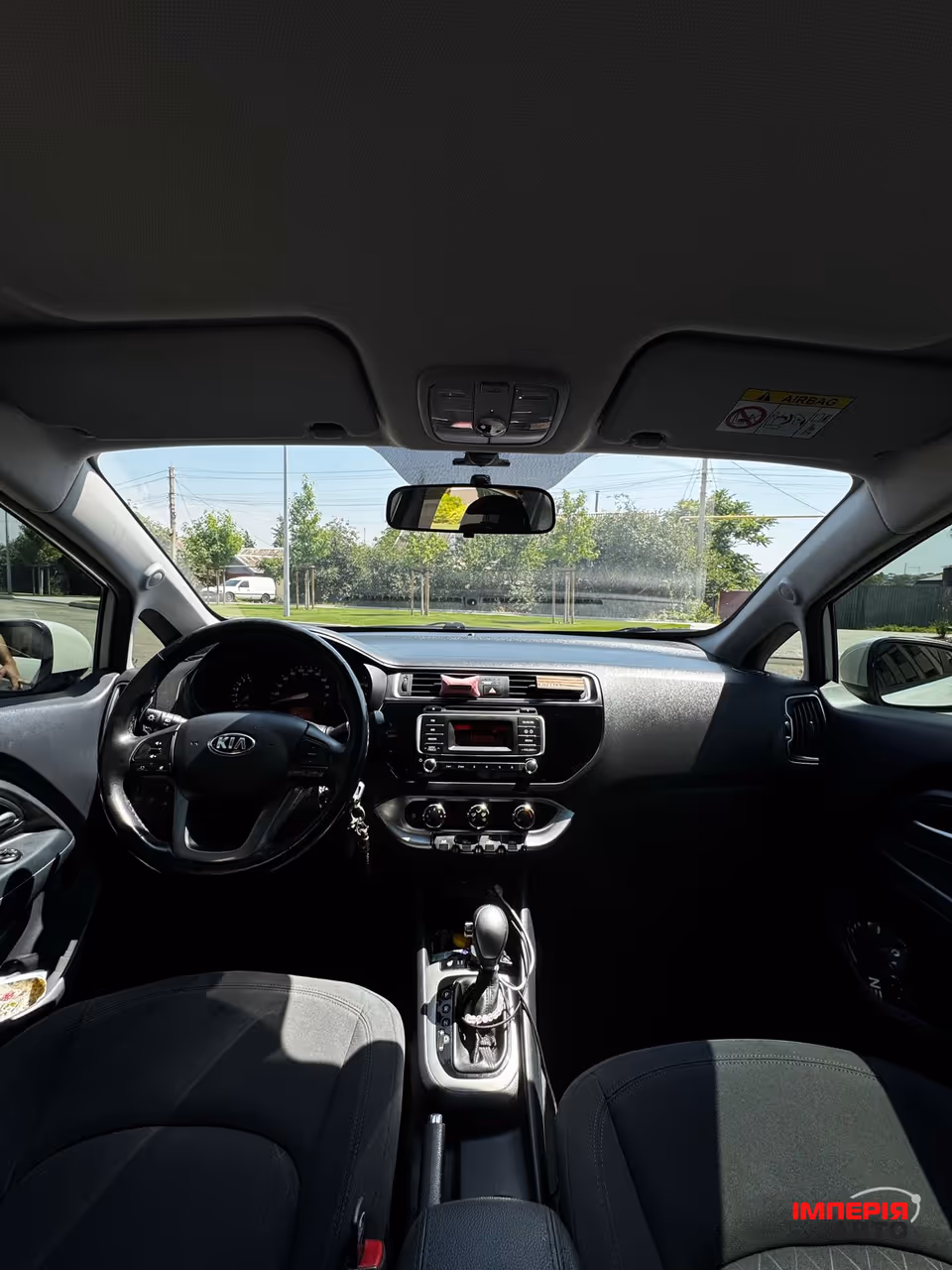Kia Rio - фото 12