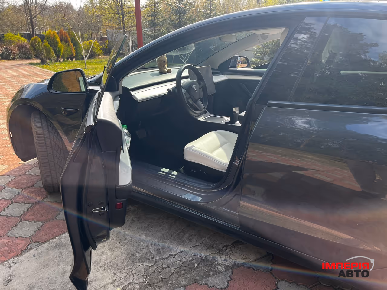 Tesla Model 3 - фото 8