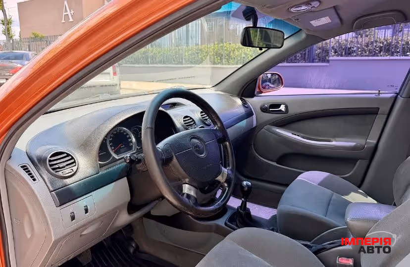 Chevrolet Lacetti - фото 13