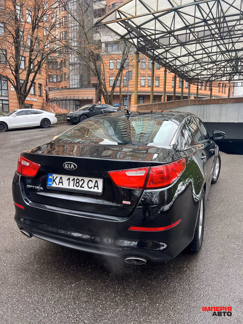 Kia Optima - фото 5