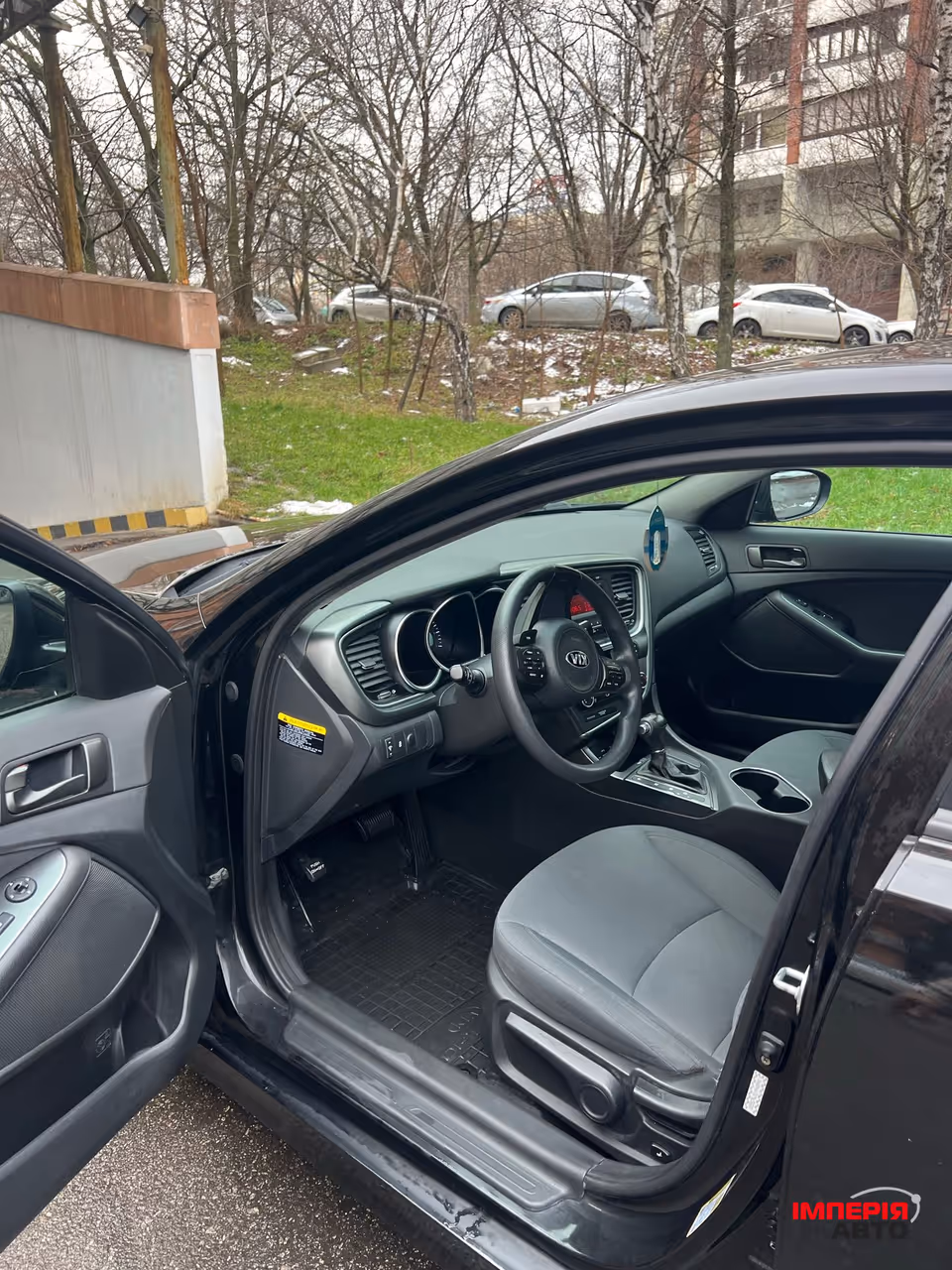 Kia Optima - фото 10