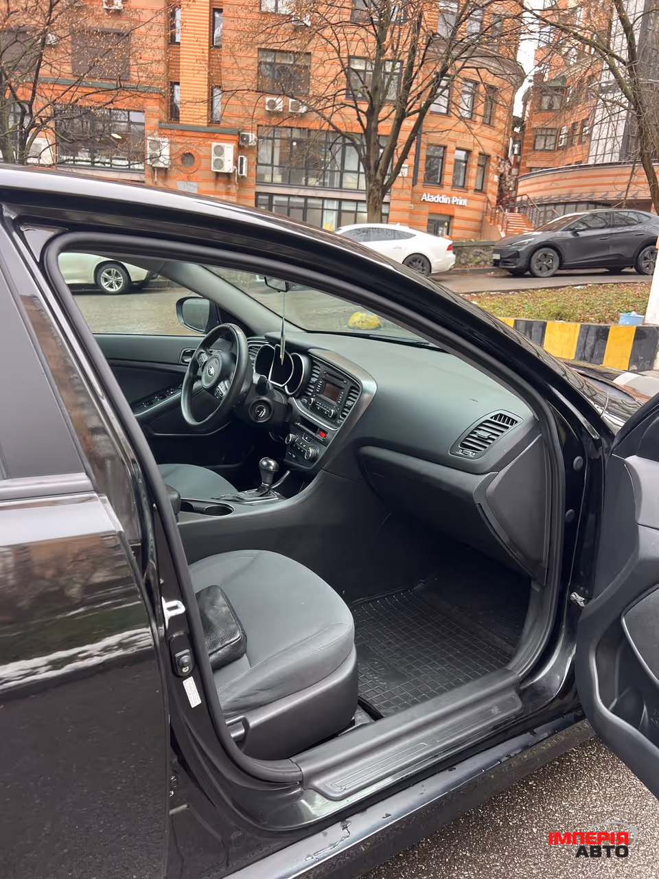 Kia Optima - фото 11