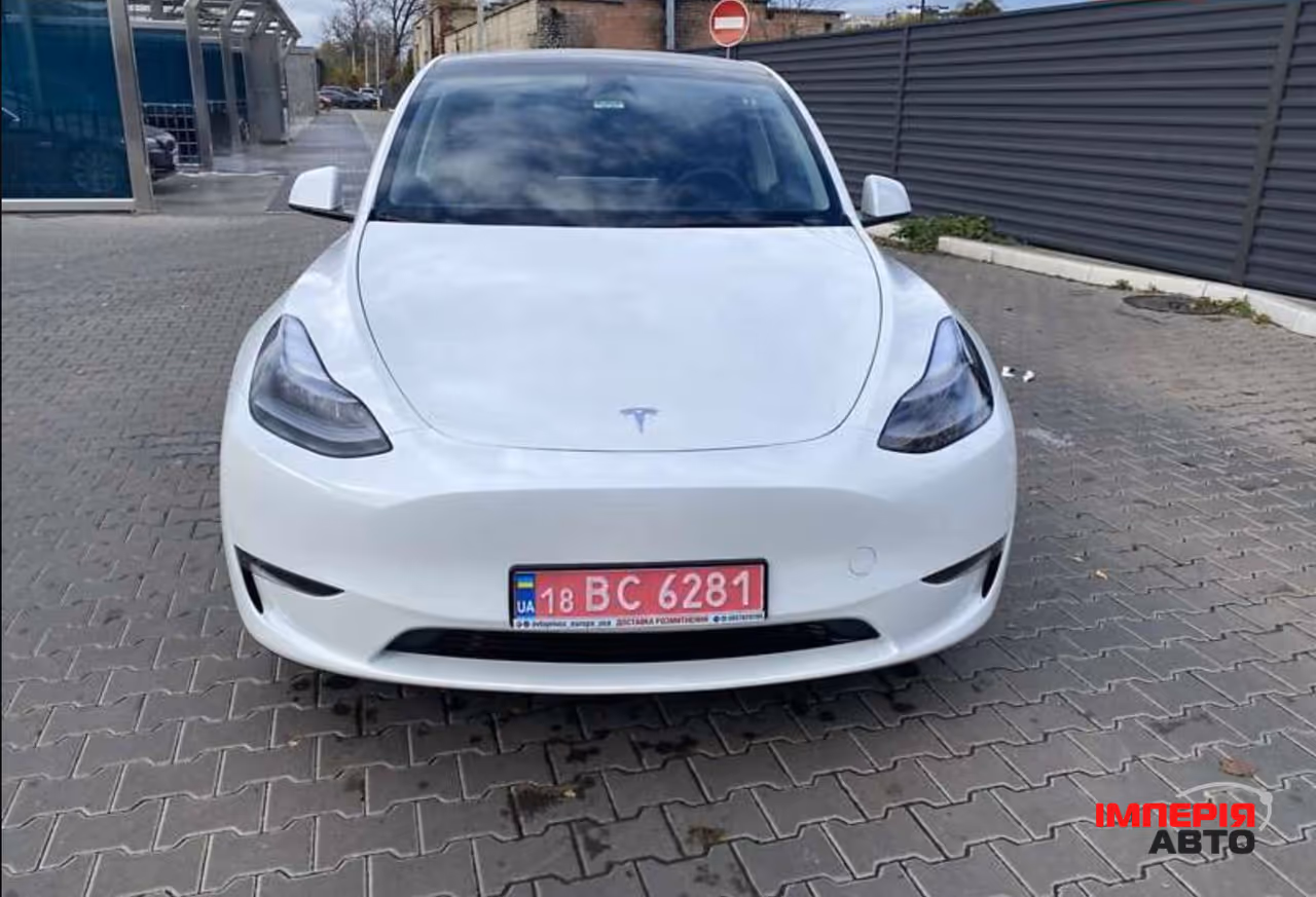 Tesla Model Y - фото 12