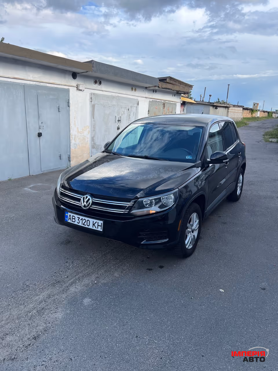 Volkswagen Tiguan - фото 1