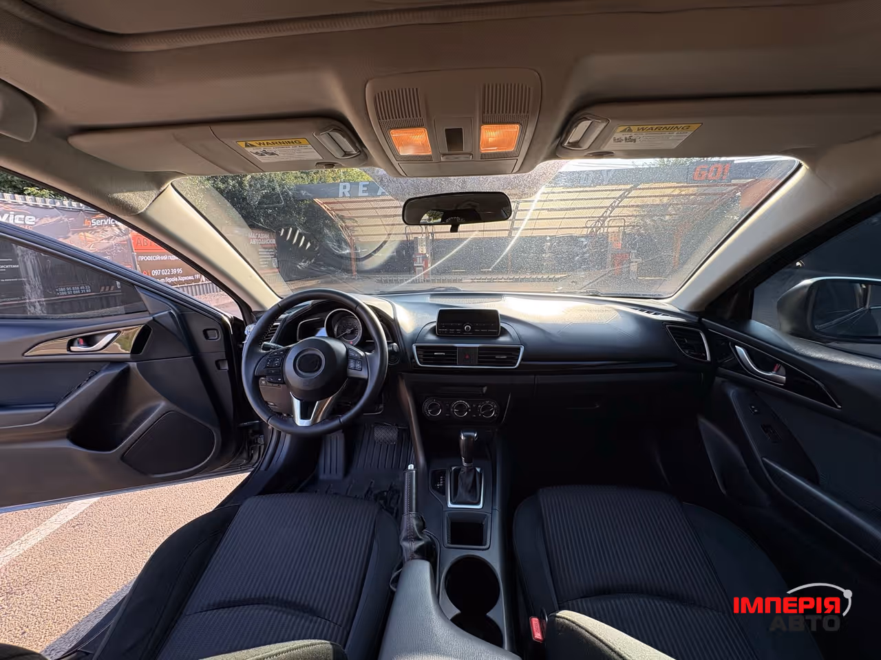Mazda 3 - фото 7