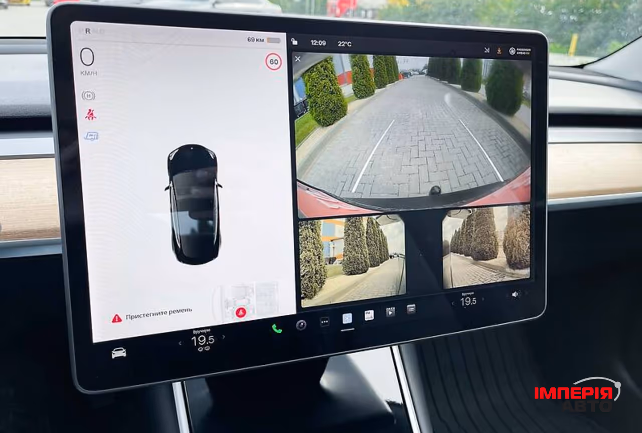 Tesla Model 3 - фото 10