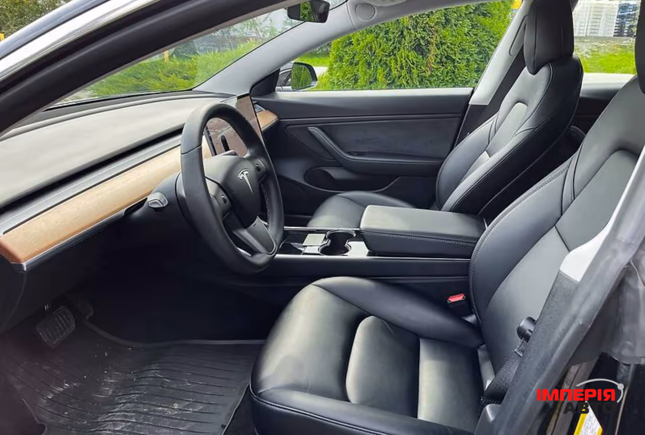 Tesla Model 3 - фото 11