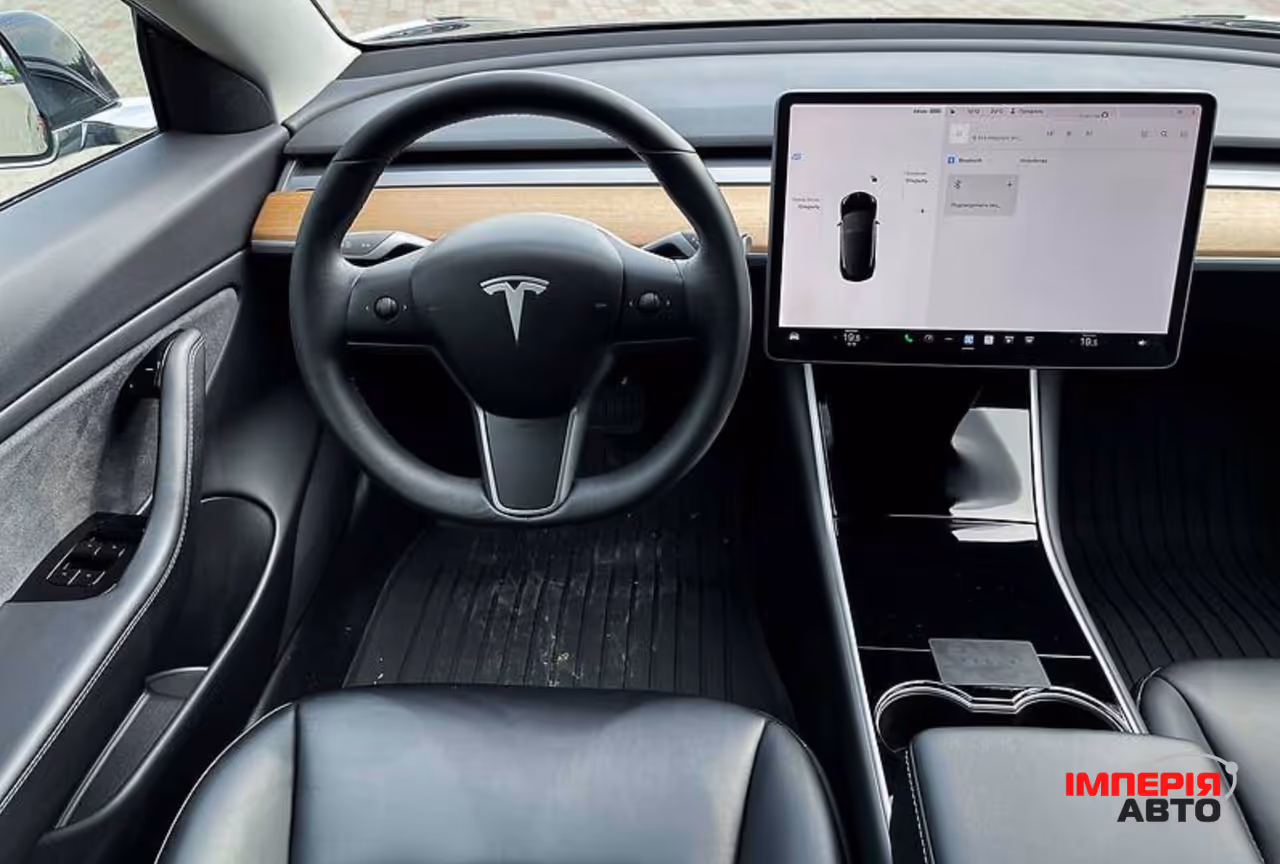 Tesla Model 3 - фото 9
