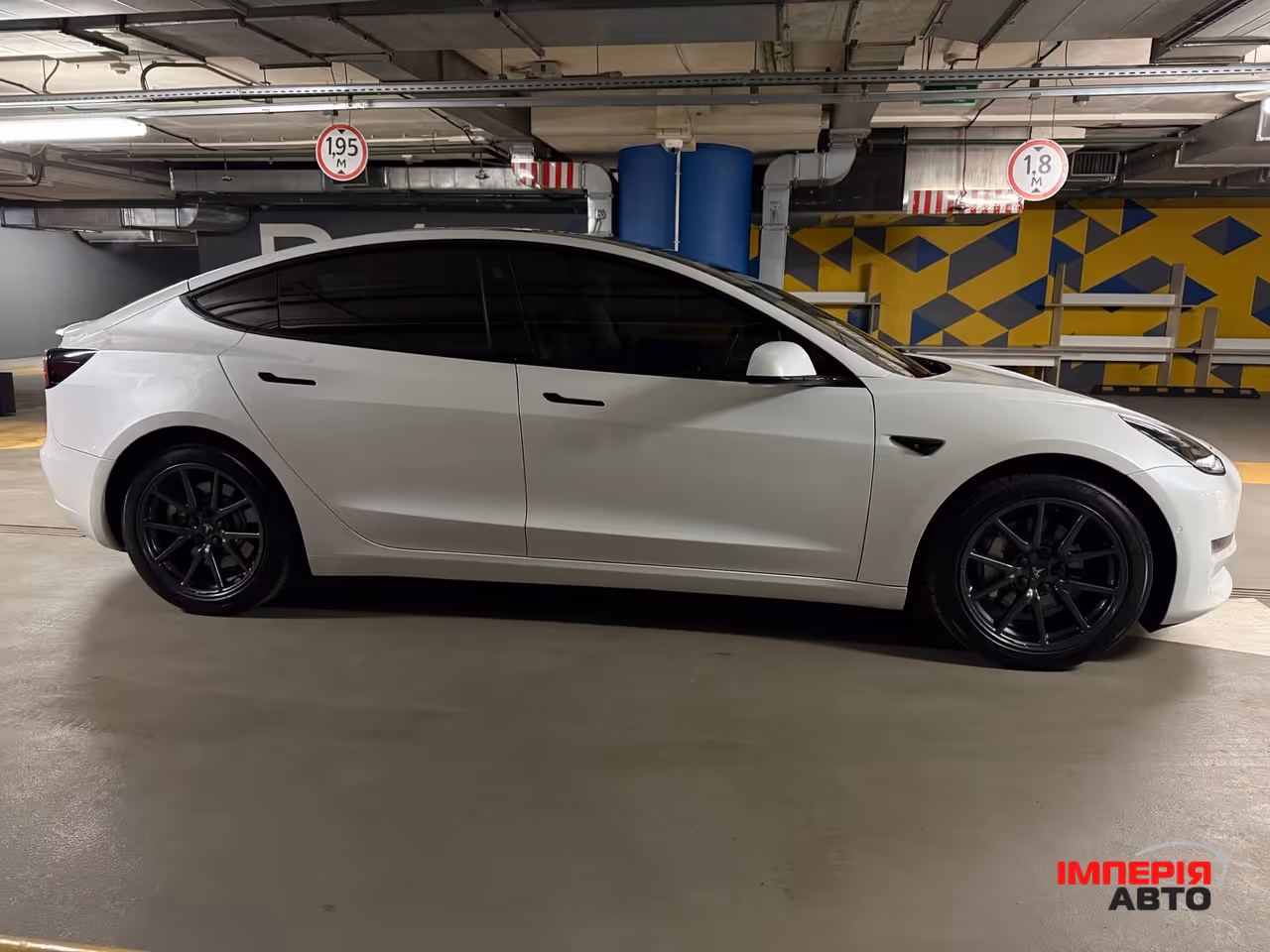 Tesla Model 3 - фото 7