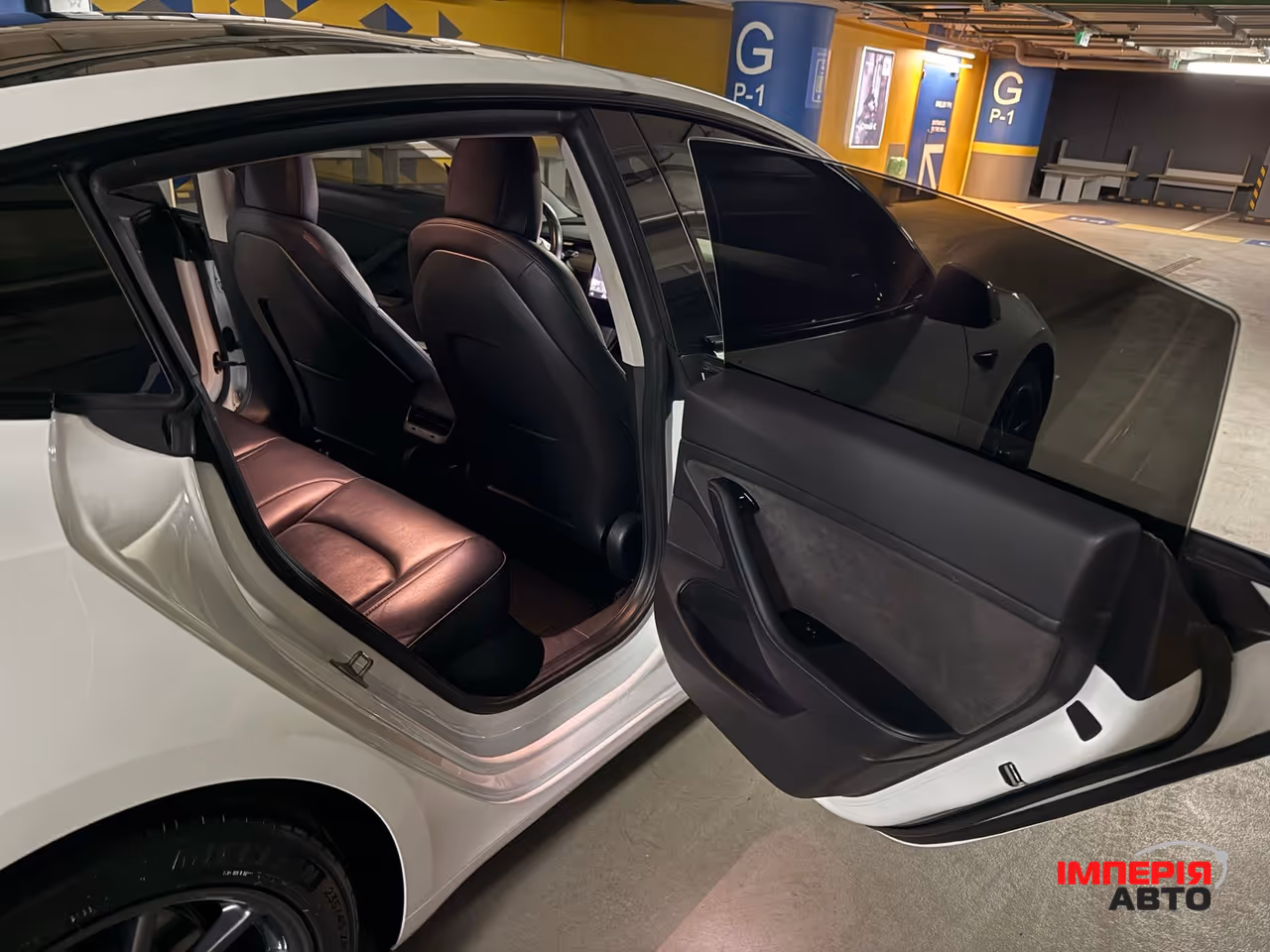 Tesla Model 3 - фото 13