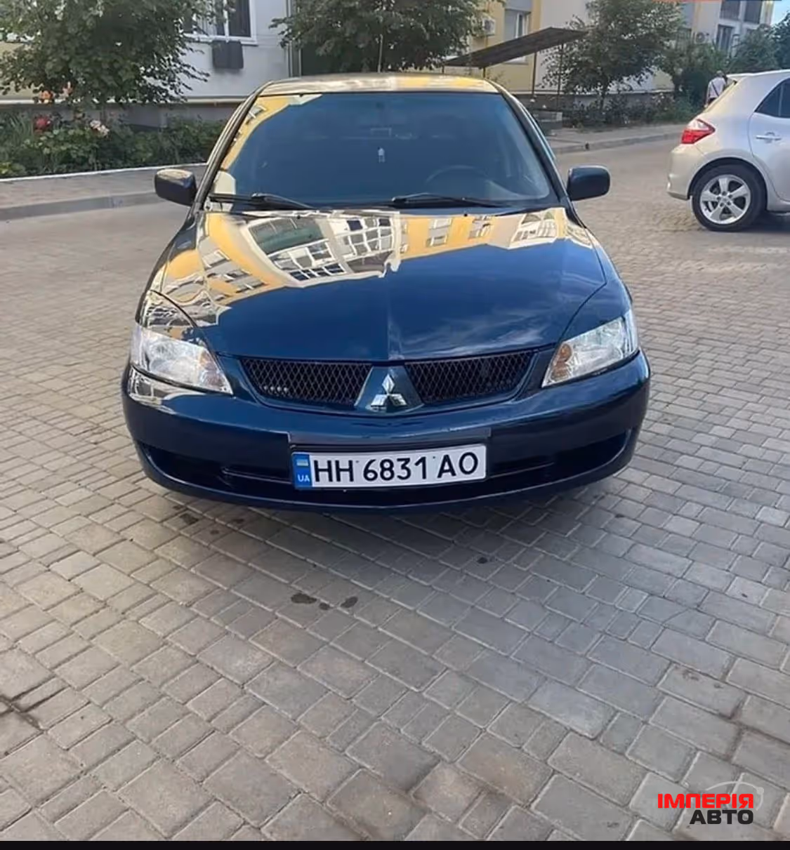 Mitsubishi Lancer - фото 1