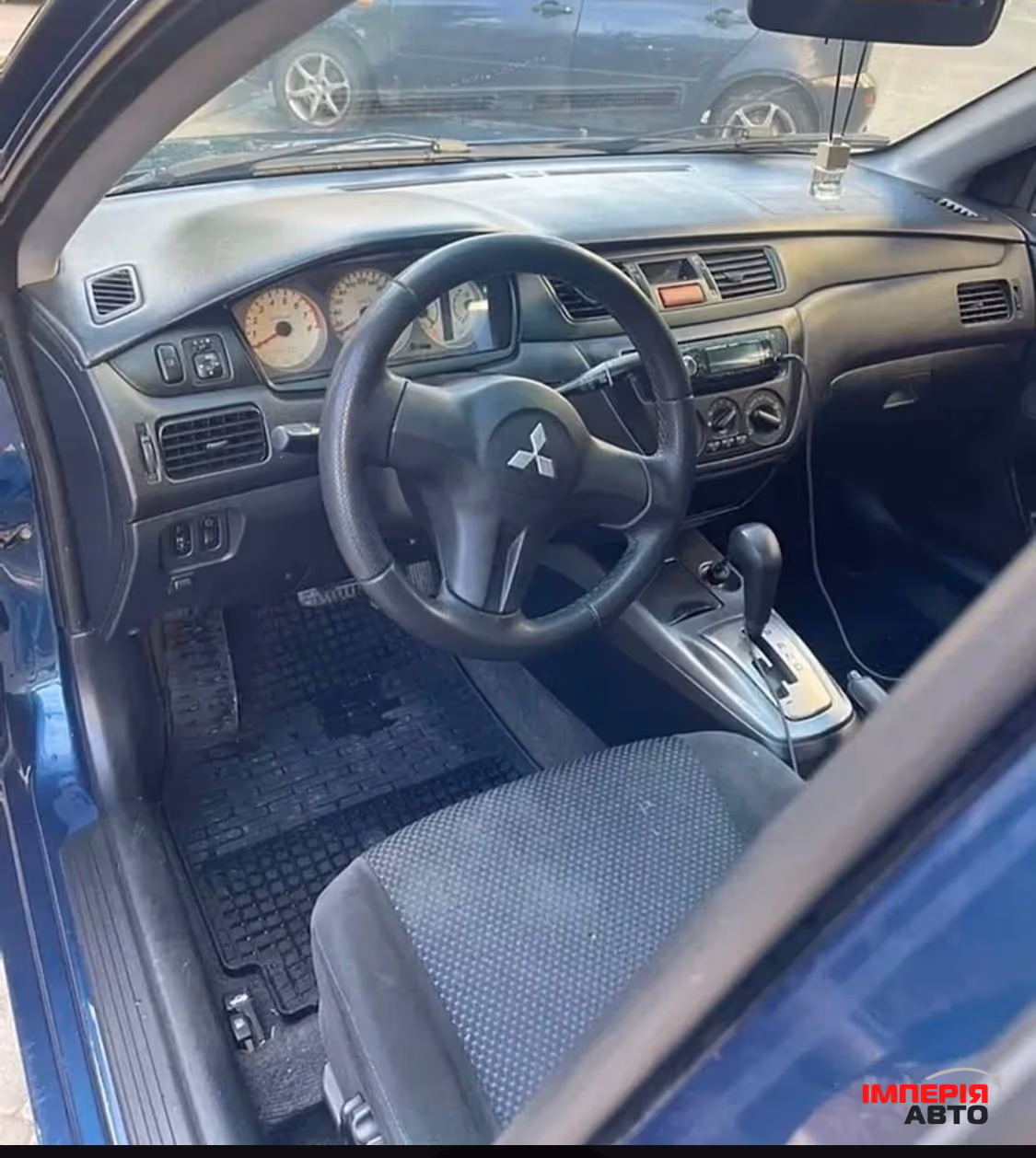 Mitsubishi Lancer - фото 13