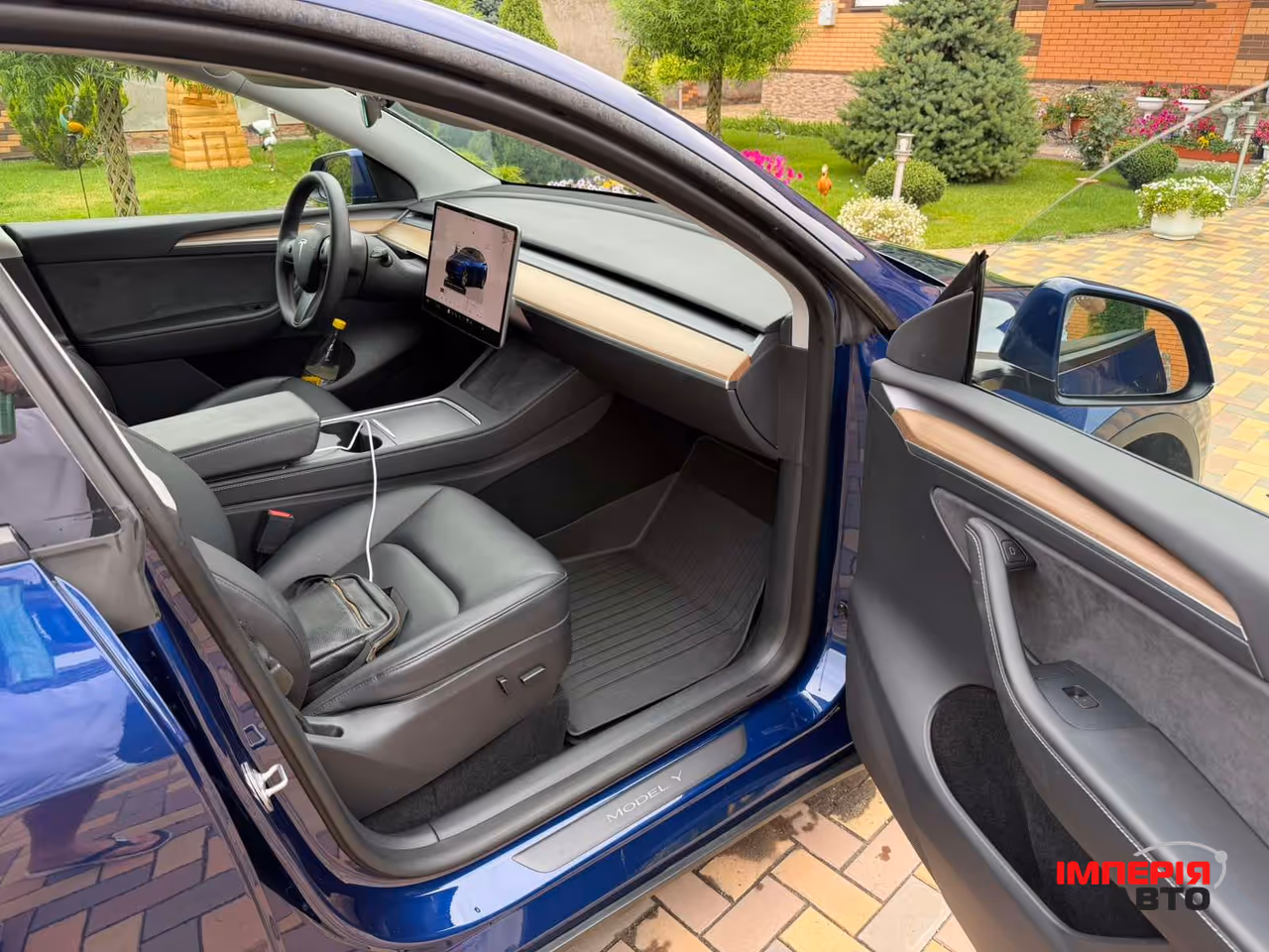 Tesla Model Y - фото 12
