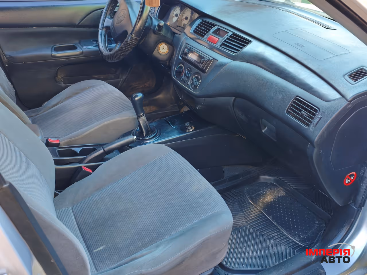 Mitsubishi Lancer - фото 8