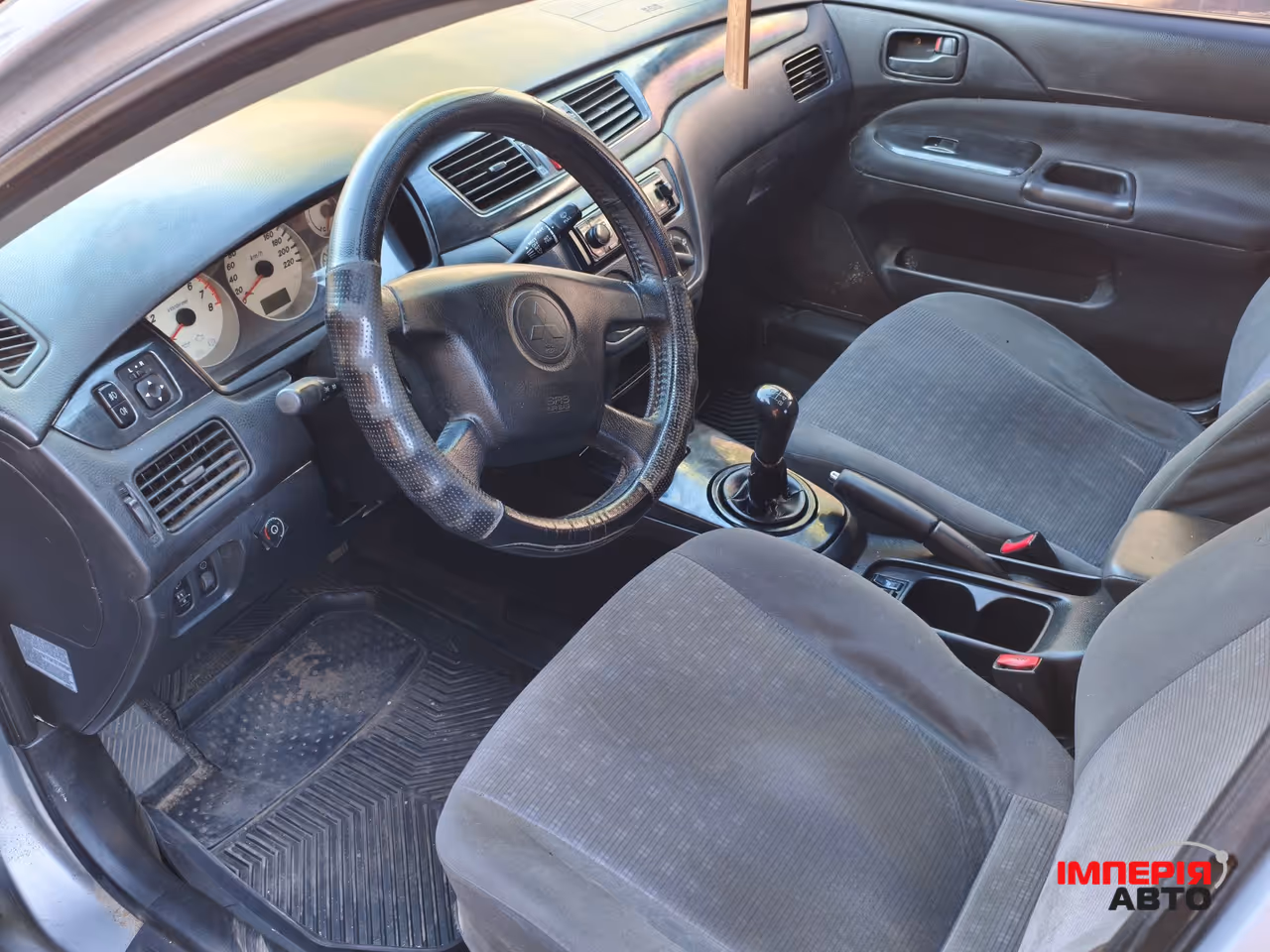 Mitsubishi Lancer - фото 7