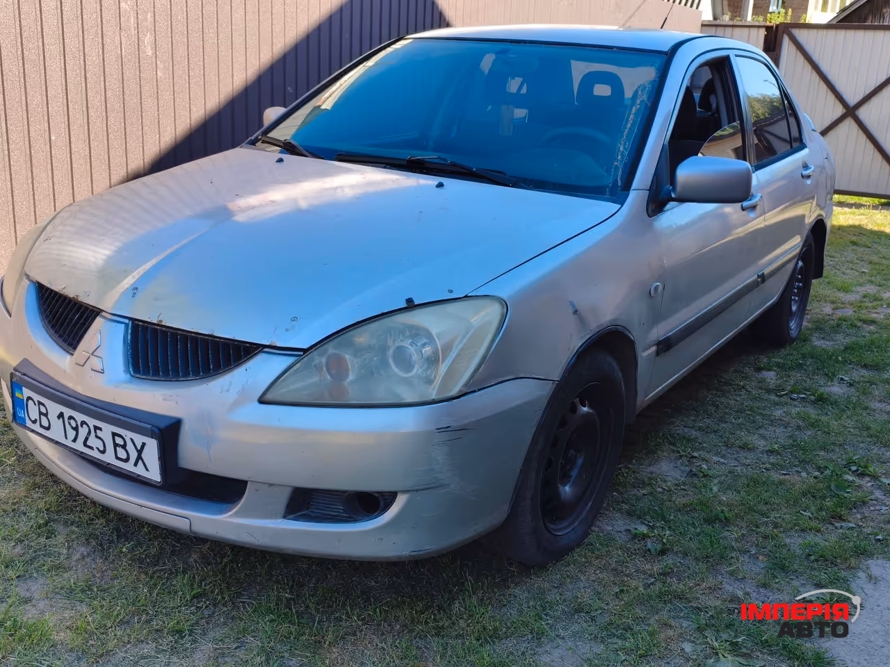 Mitsubishi Lancer - фото 1