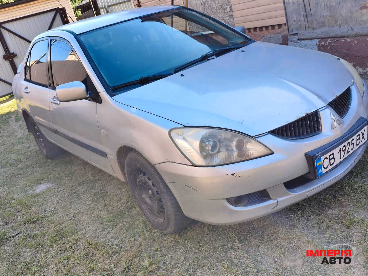 Mitsubishi Lancer - фото 3