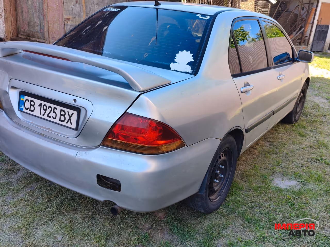 Mitsubishi Lancer - фото 4