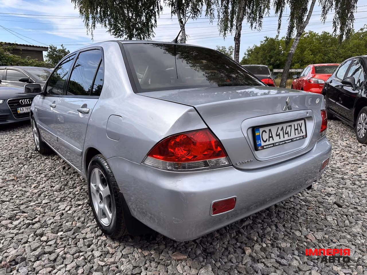 Mitsubishi Lancer - фото 13