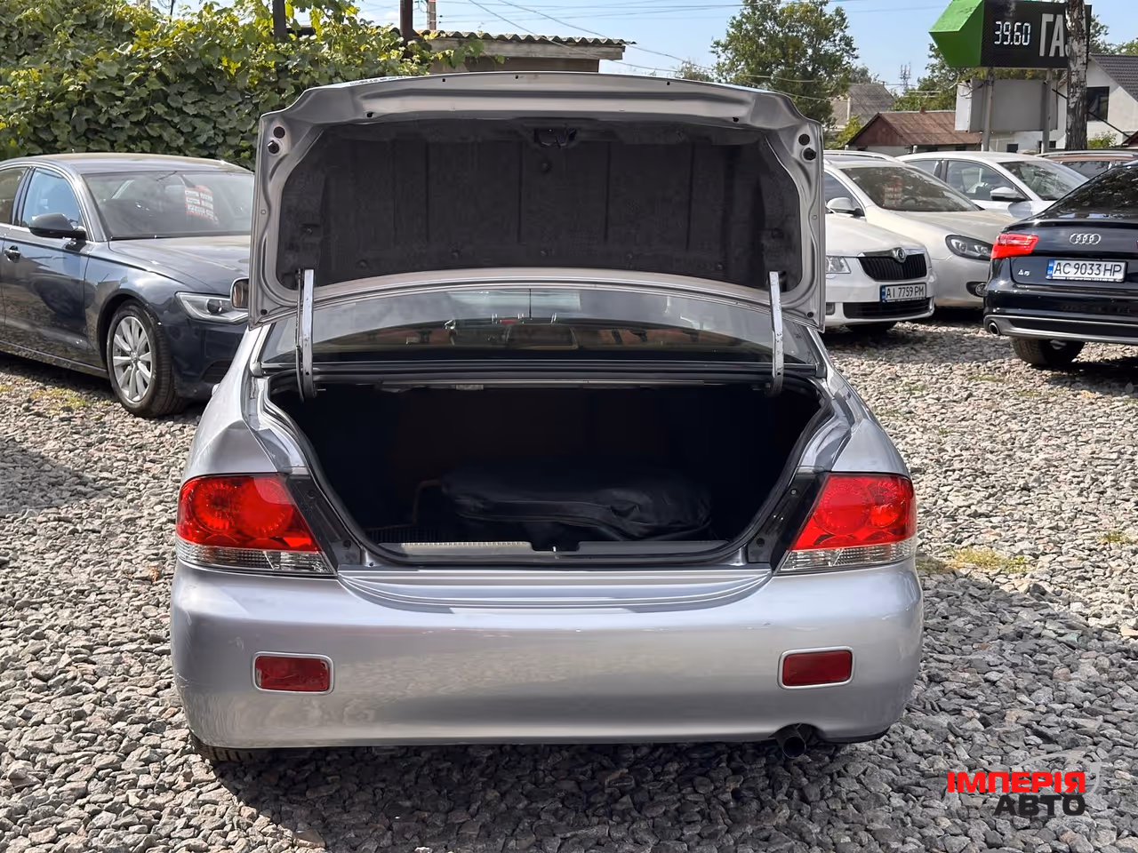 Mitsubishi Lancer - фото 12