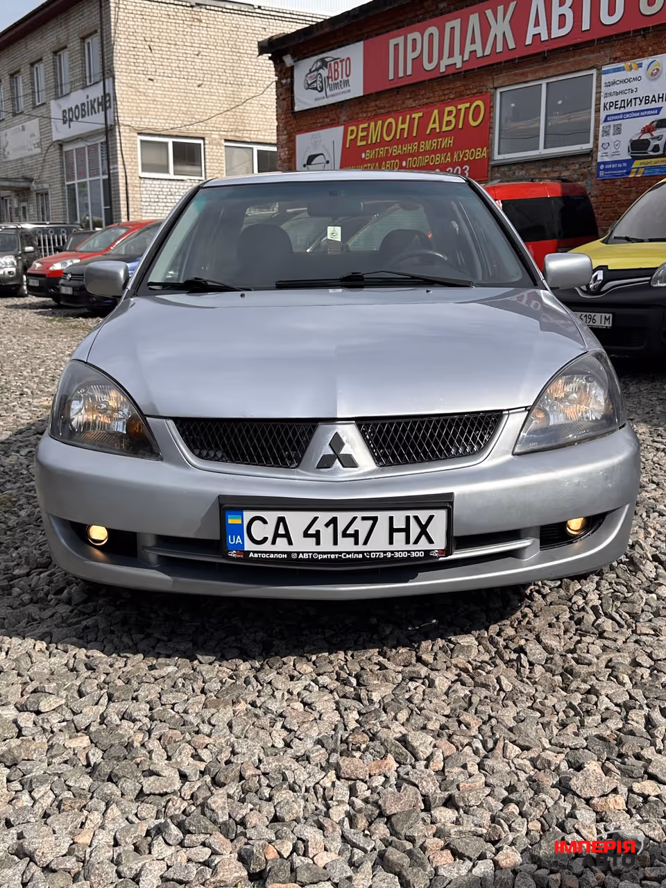 Mitsubishi Lancer - фото 3