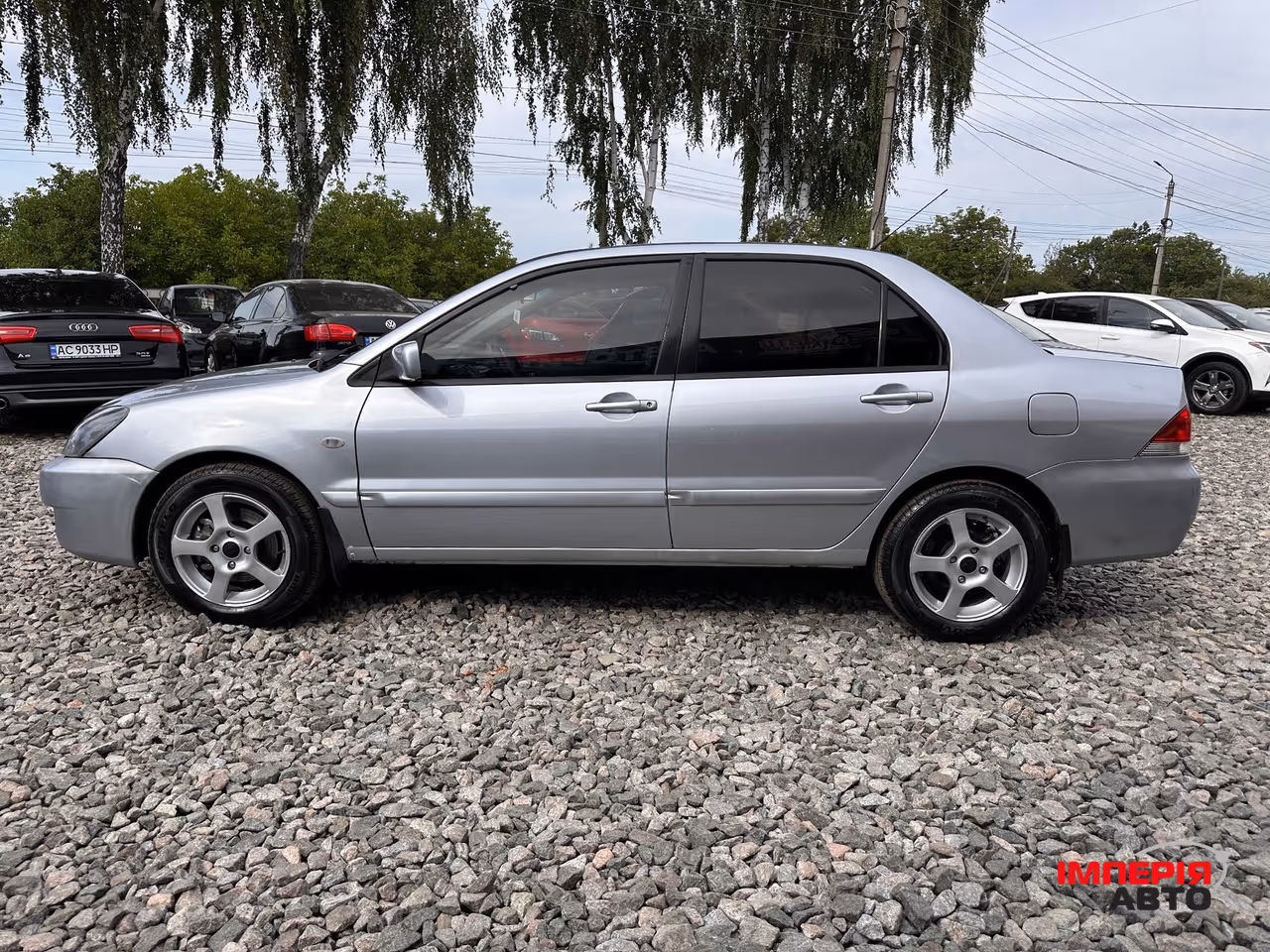 Mitsubishi Lancer - фото 15