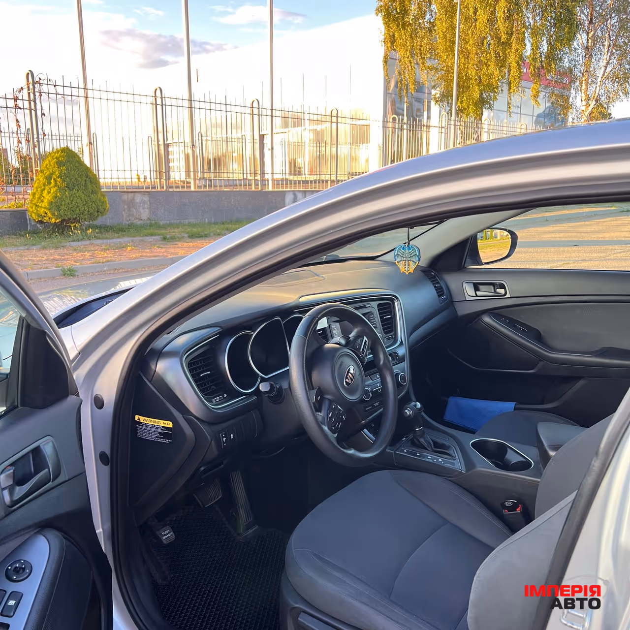 Kia Optima - фото 8