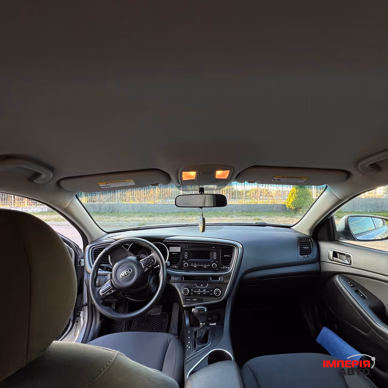 Kia Optima - фото 7