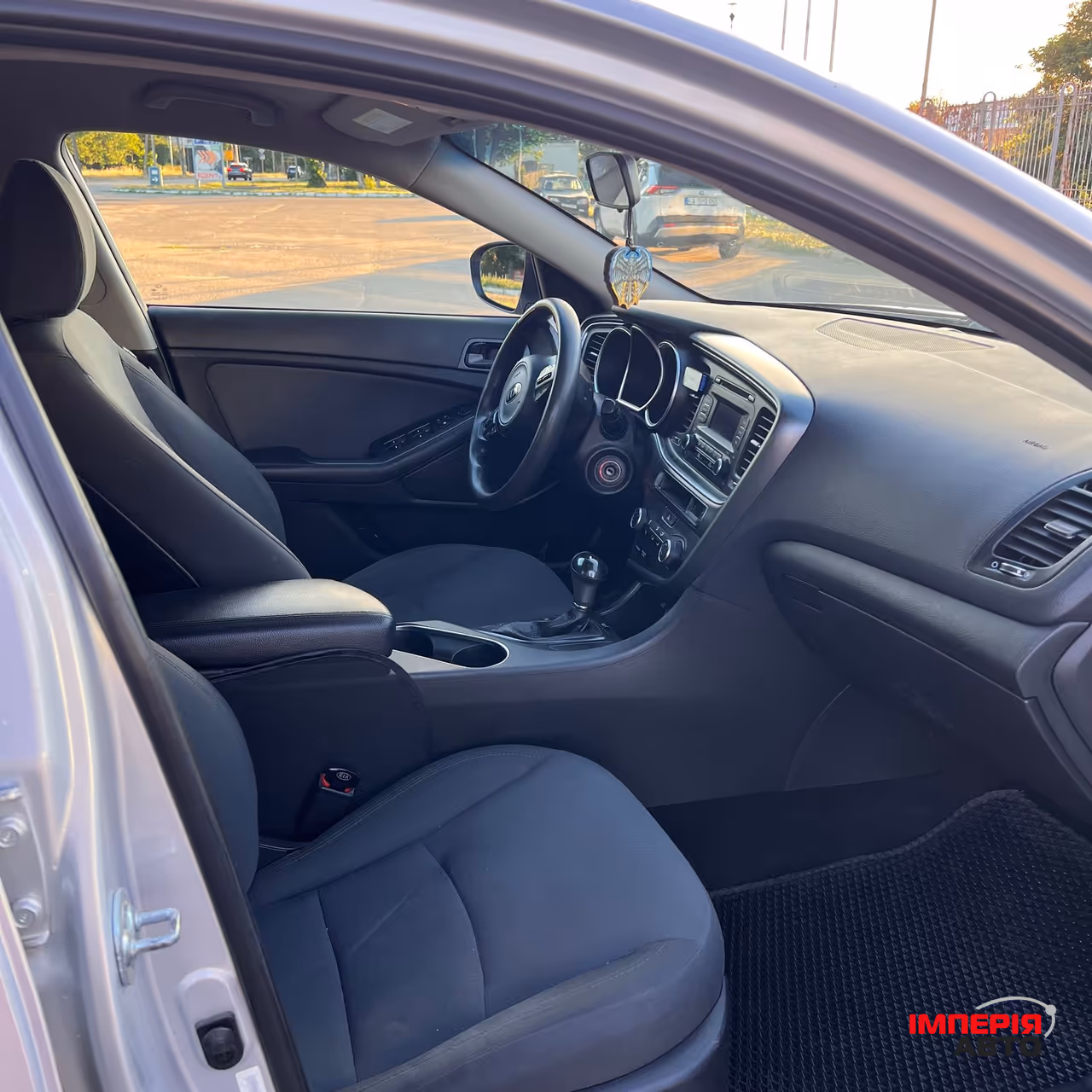Kia Optima - фото 9