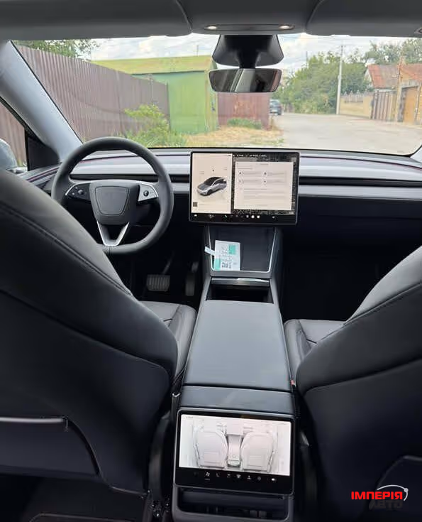 Tesla Model Y - фото 8