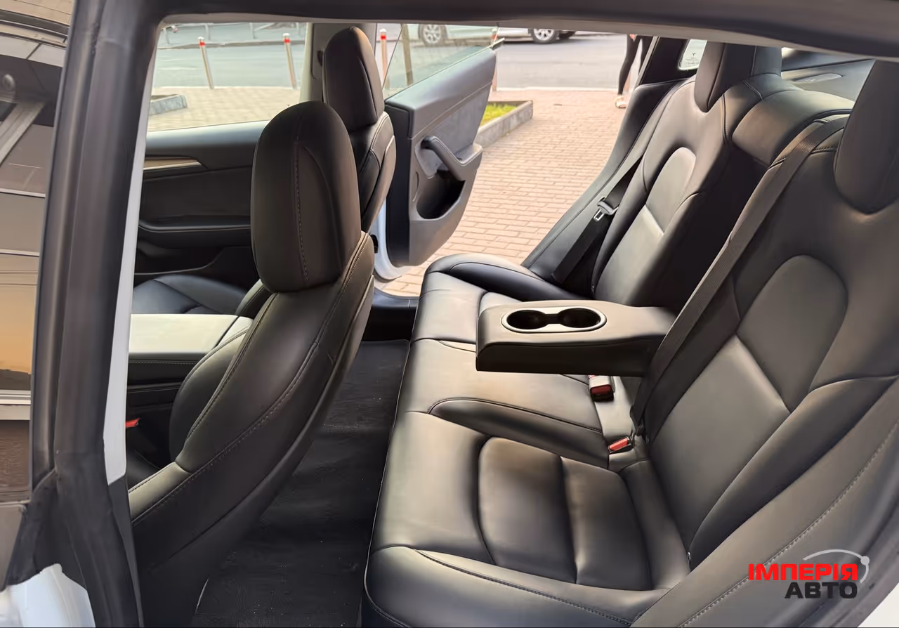 Tesla Model 3 - фото 8