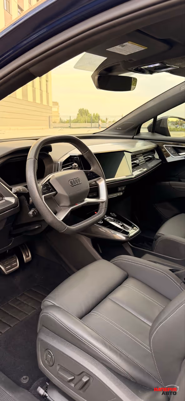 Audi Q4 e-tron - фото 21