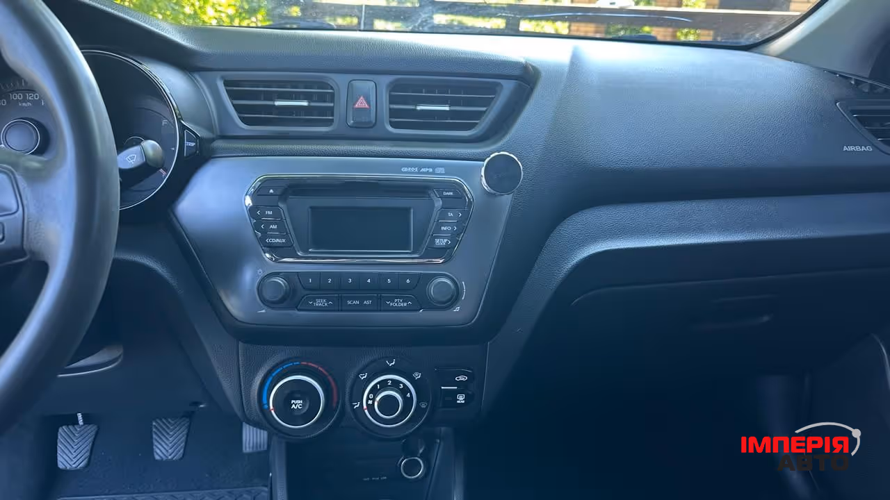 Kia Rio - фото 6