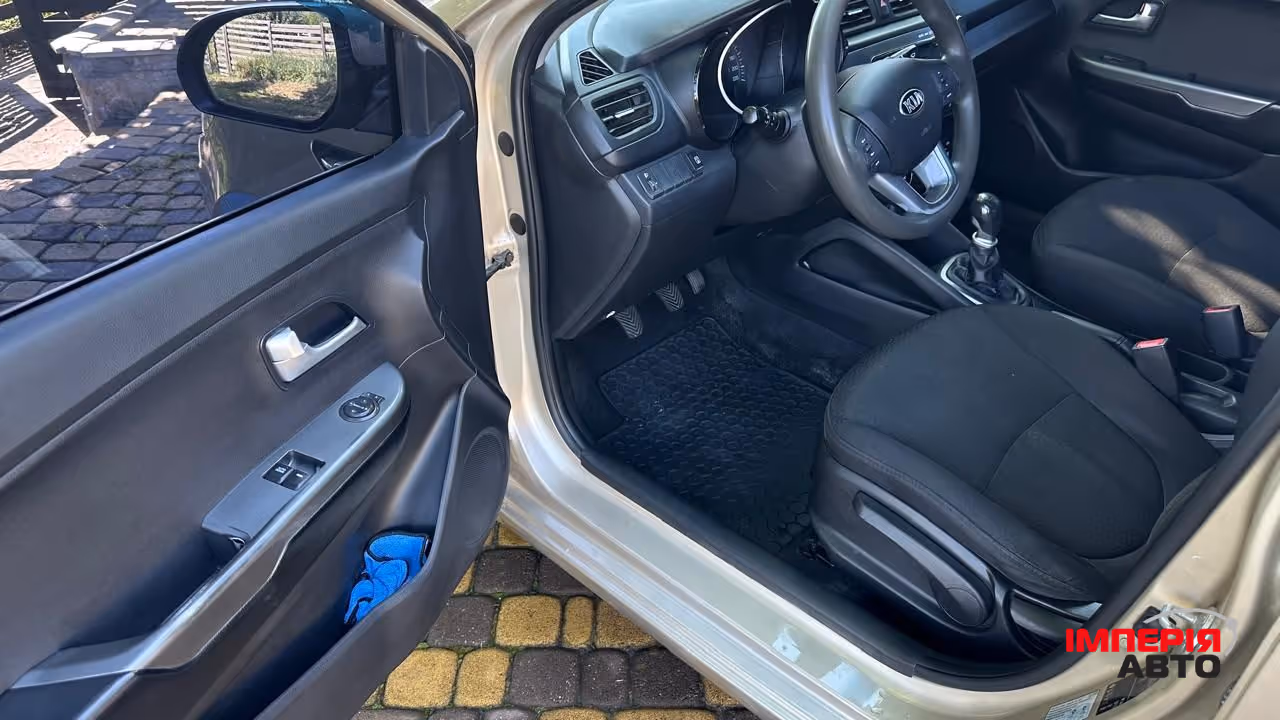 Kia Rio - фото 8