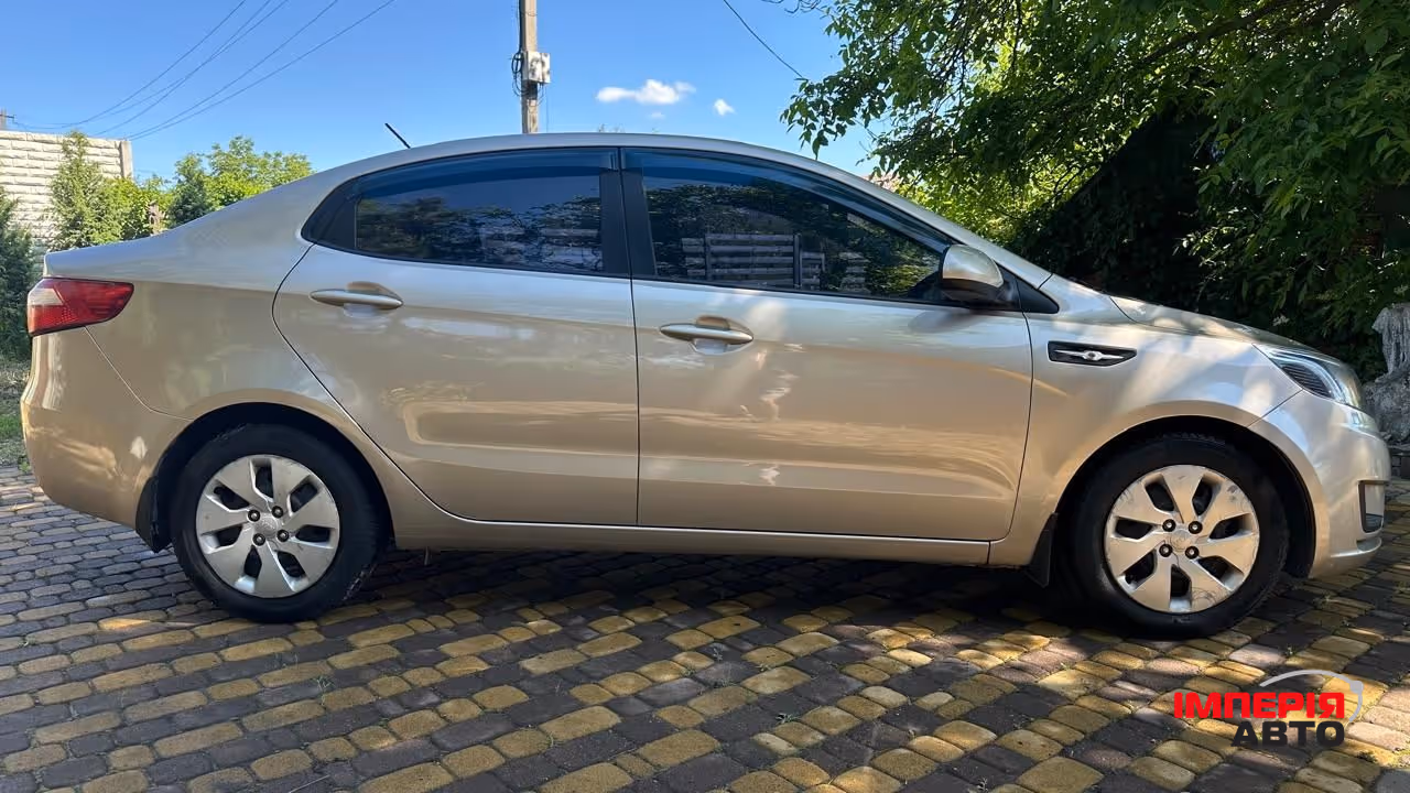 Kia Rio - фото 4