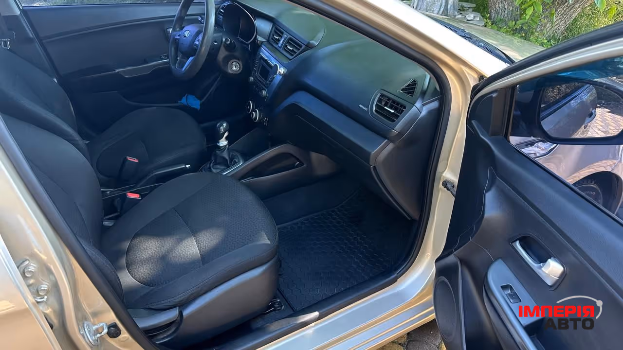 Kia Rio - фото 7