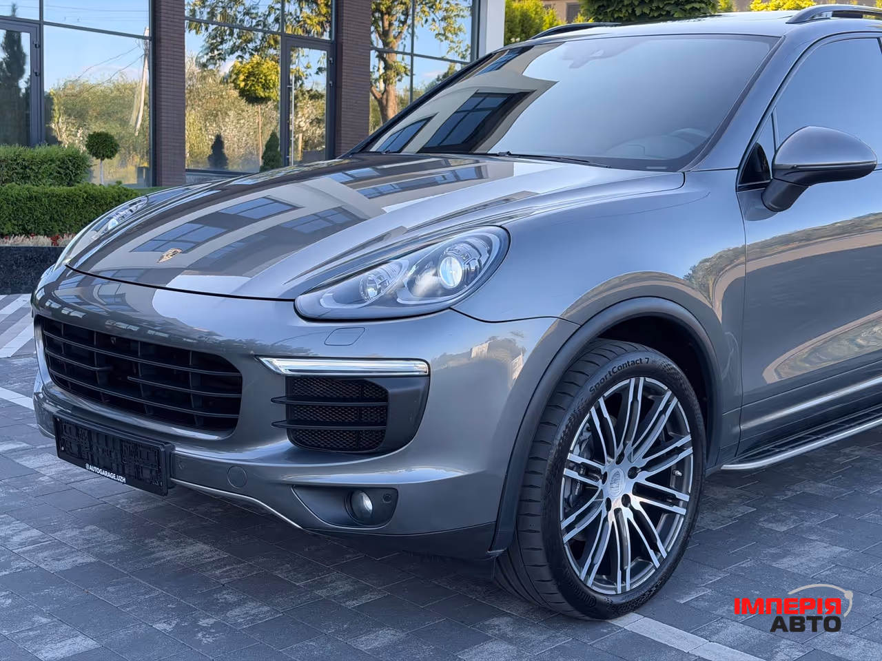 Porsche Cayenne - фото 16