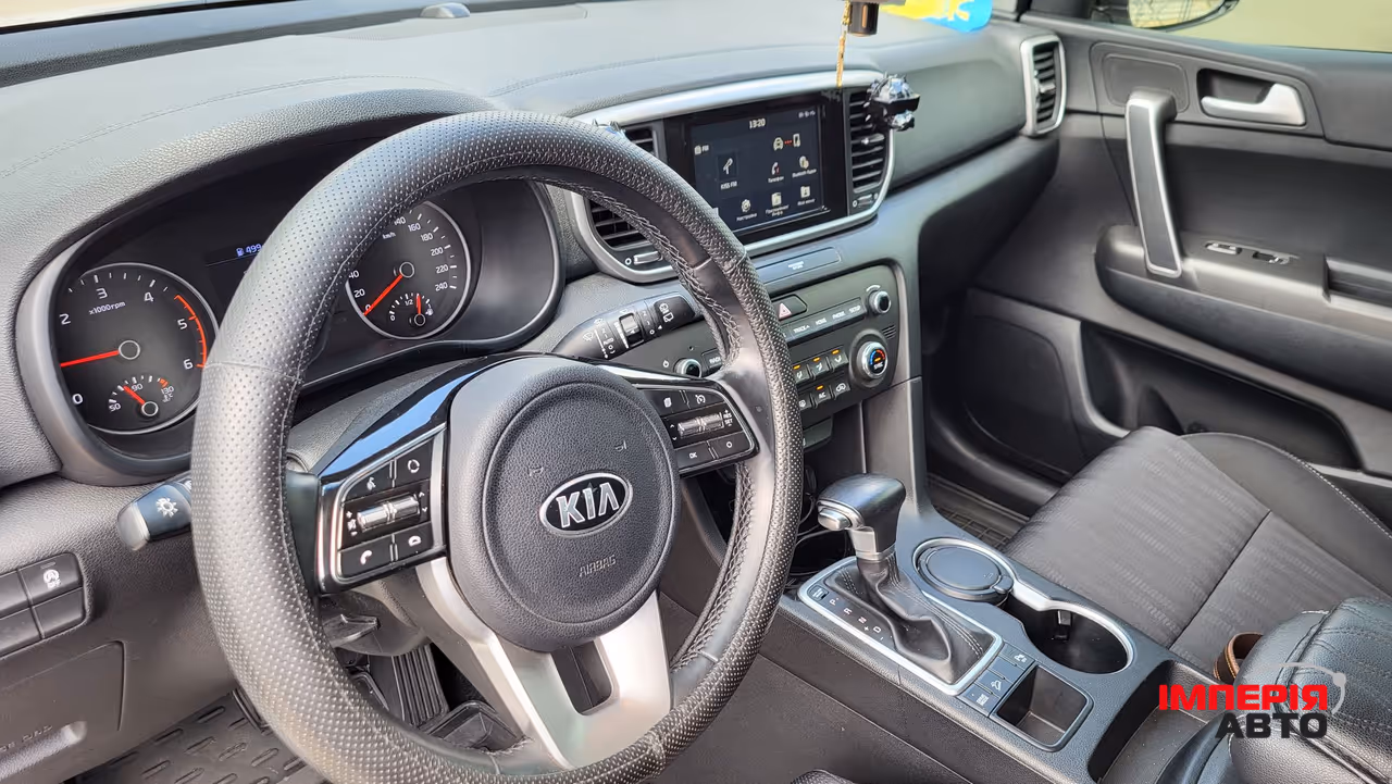 Kia Sportage - фото 7