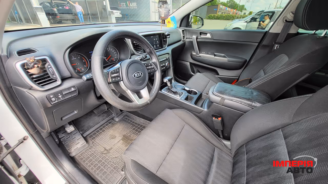 Kia Sportage - фото 8