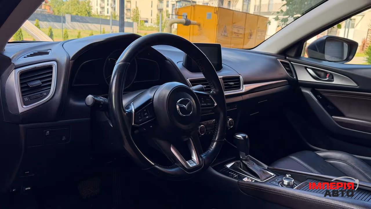 Mazda 3 - фото 13
