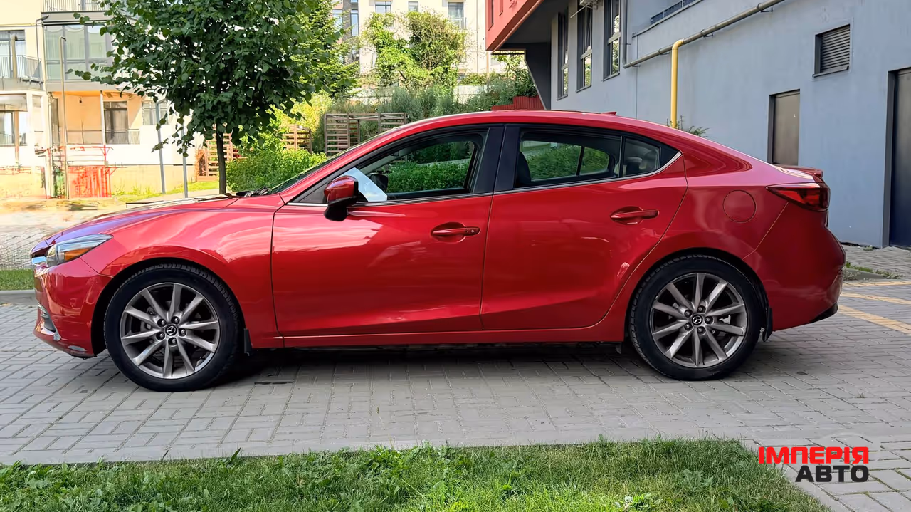 Mazda 3 - фото 4