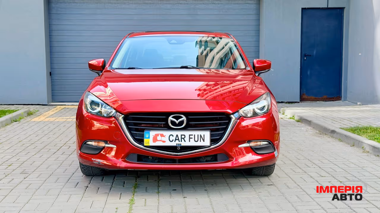 Mazda 3 - фото 2