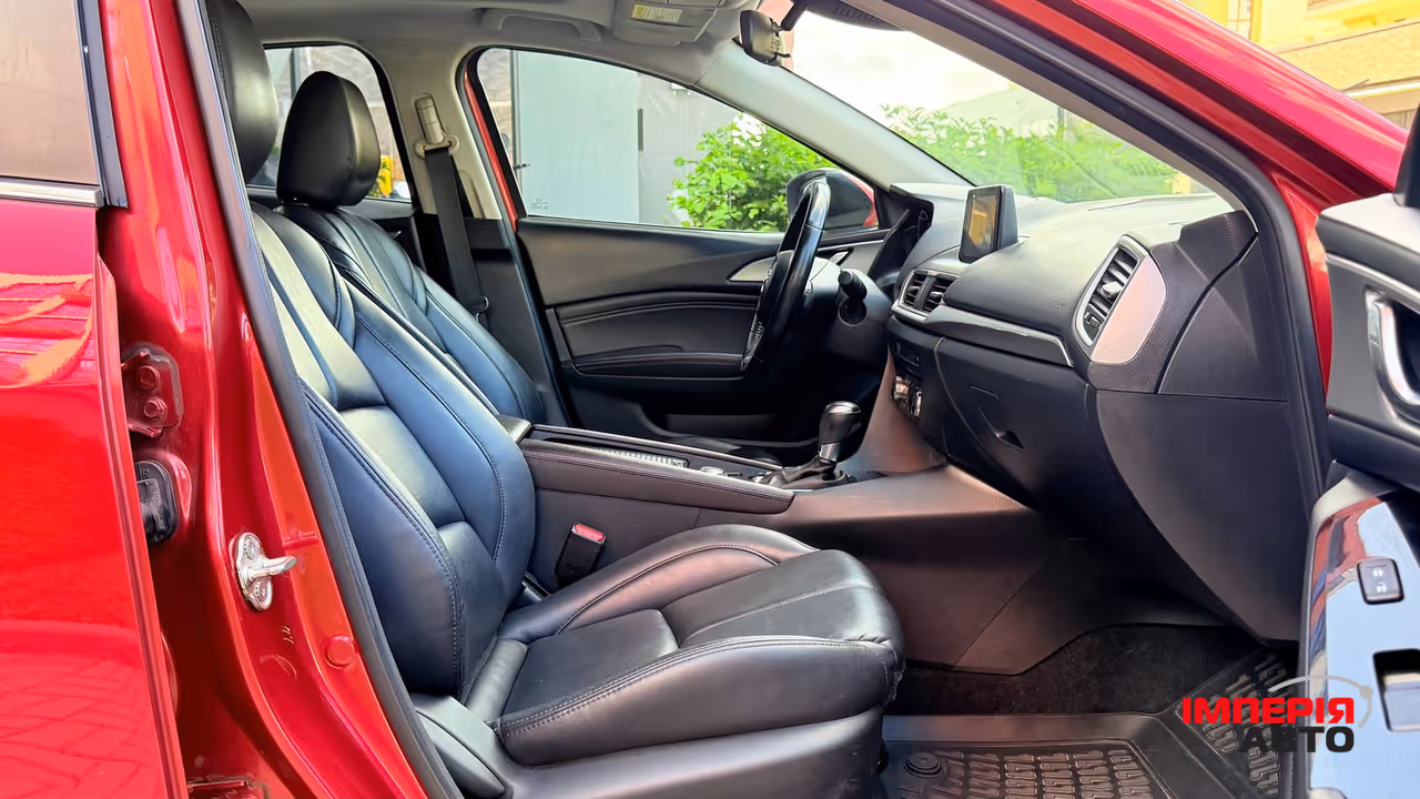 Mazda 3 - фото 10